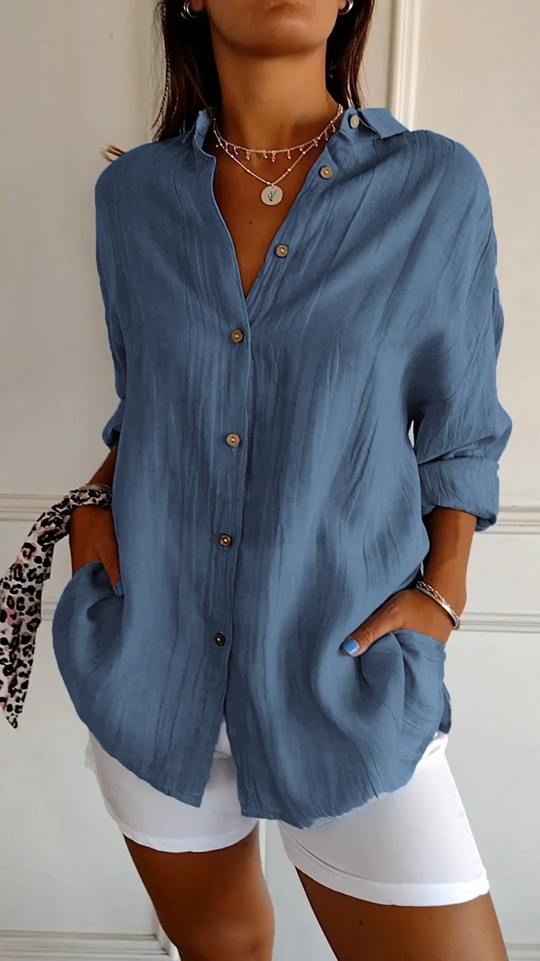 Azure blue oversized linen-look women's button-down shirt with wooden-tone buttons and spread collar