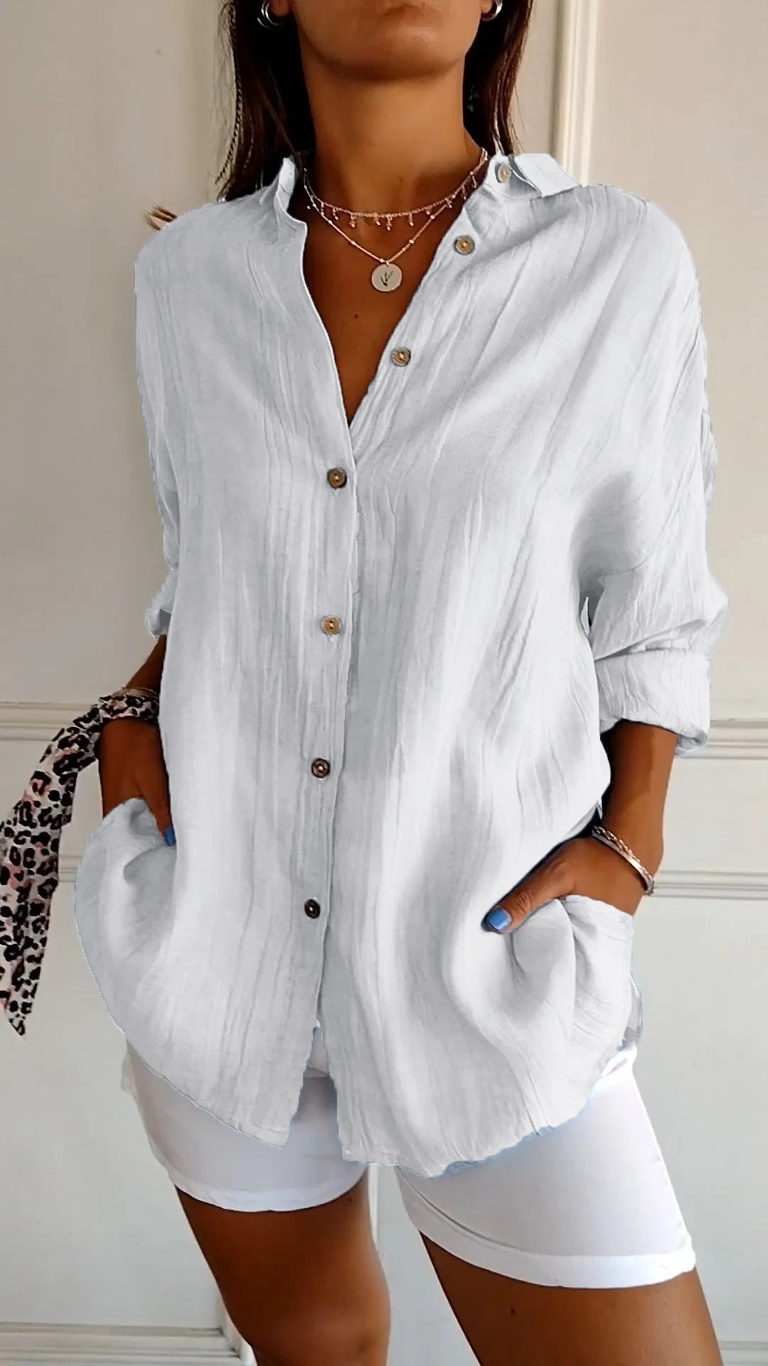 Azure blue oversized linen-look women's button-down shirt with wooden-tone buttons and spread collar