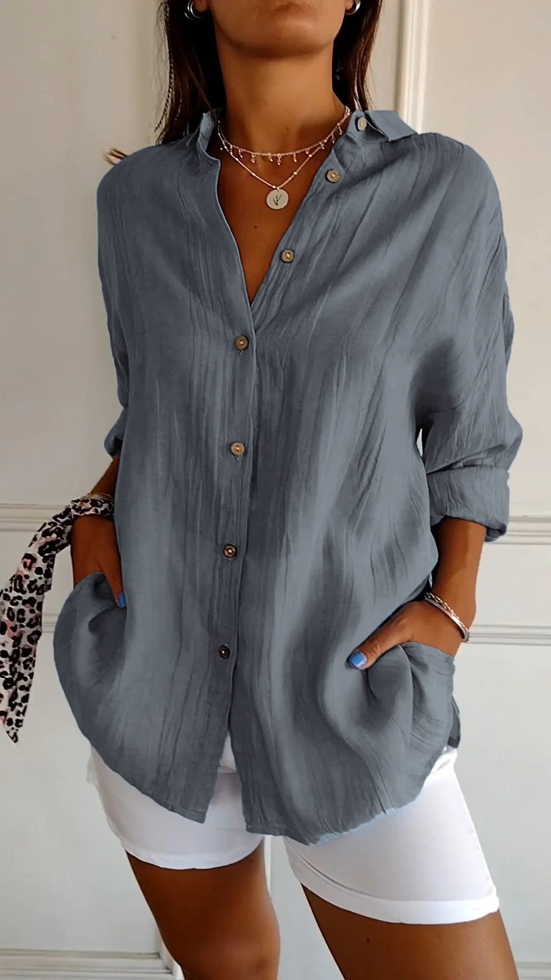 Azure blue oversized linen-look women's shirt with wooden-tone buttons and relaxed long sleeve fit
