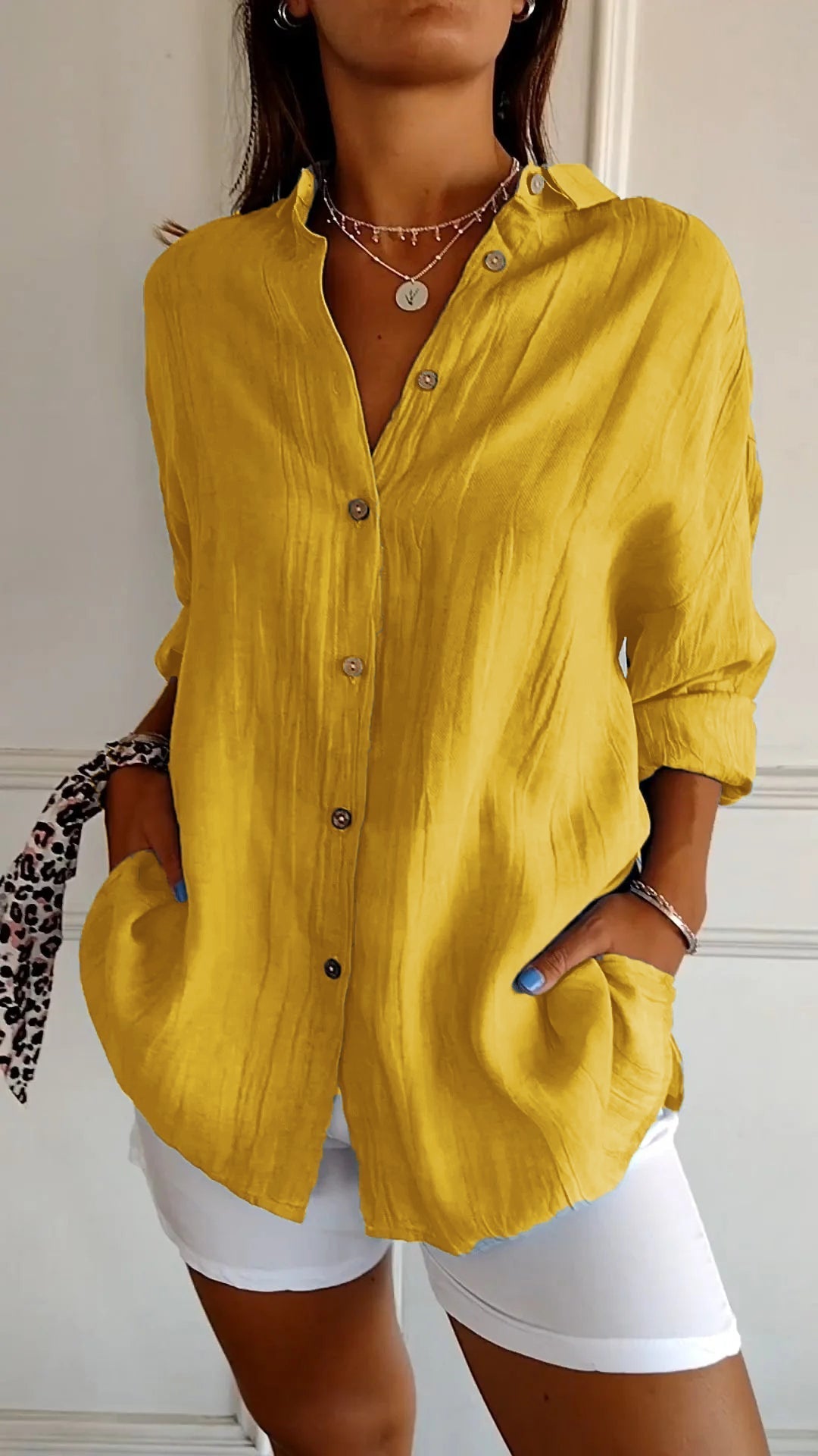 Azure blue oversized linen-look women's button-down shirt with wooden-tone buttons and relaxed long sleeves