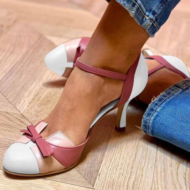 Donna elegant heel sandals in neutral tone with refined silhouette and timeless sophisticated design