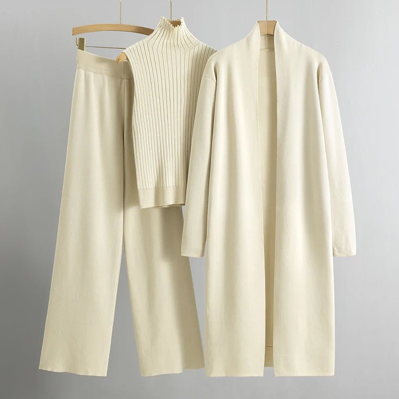 Elegant three-piece women's set in neutral tones, polished relaxed-fit design with layered styling