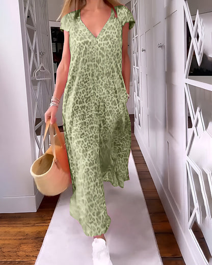 Women's loose fit long cocktail dress in floral print with V-neckline and short sleeves