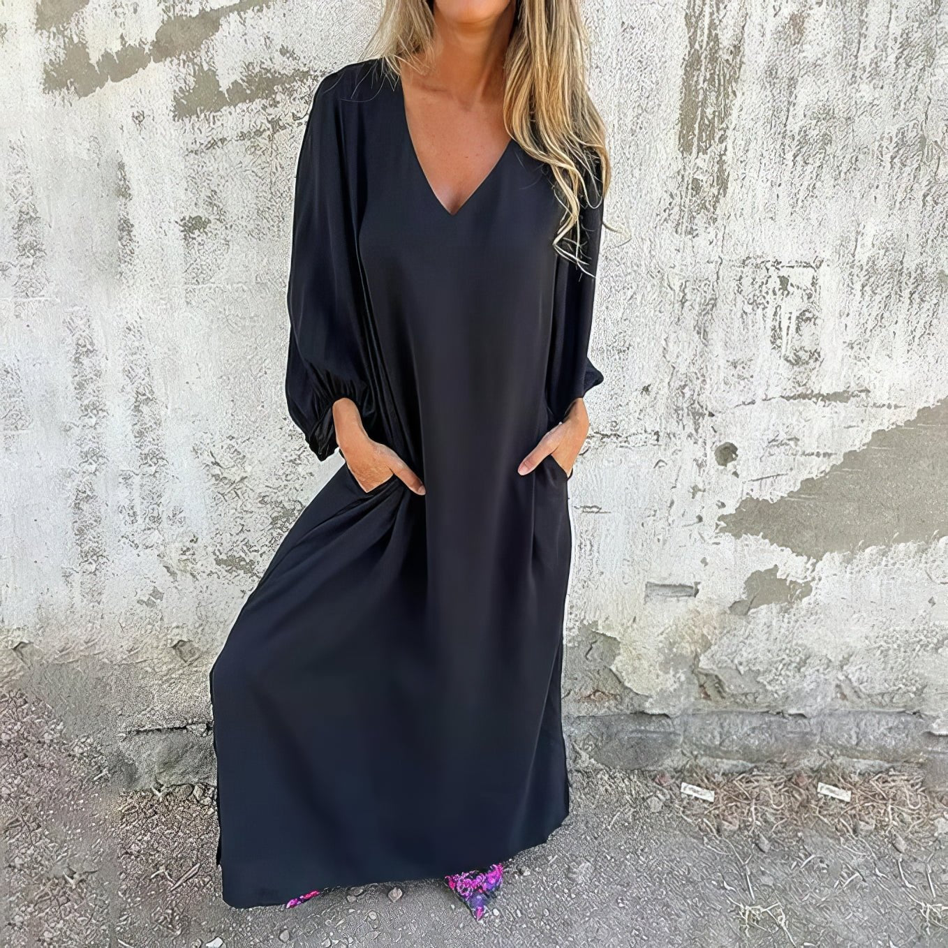Flowing maxi dress with deep side slit and hidden pockets, effortless elegant drape style