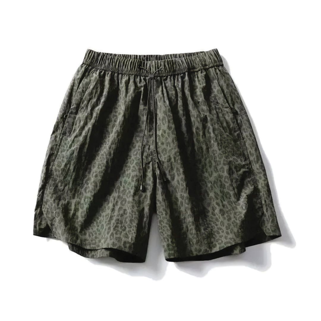EchoTrek leopard print quick-dry nylon shorts with elastic drawstring waist, relaxed knee-length fit