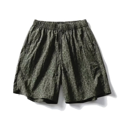 EchoTrek leopard print quick-dry nylon shorts with elastic drawstring waist, relaxed knee-length fit
