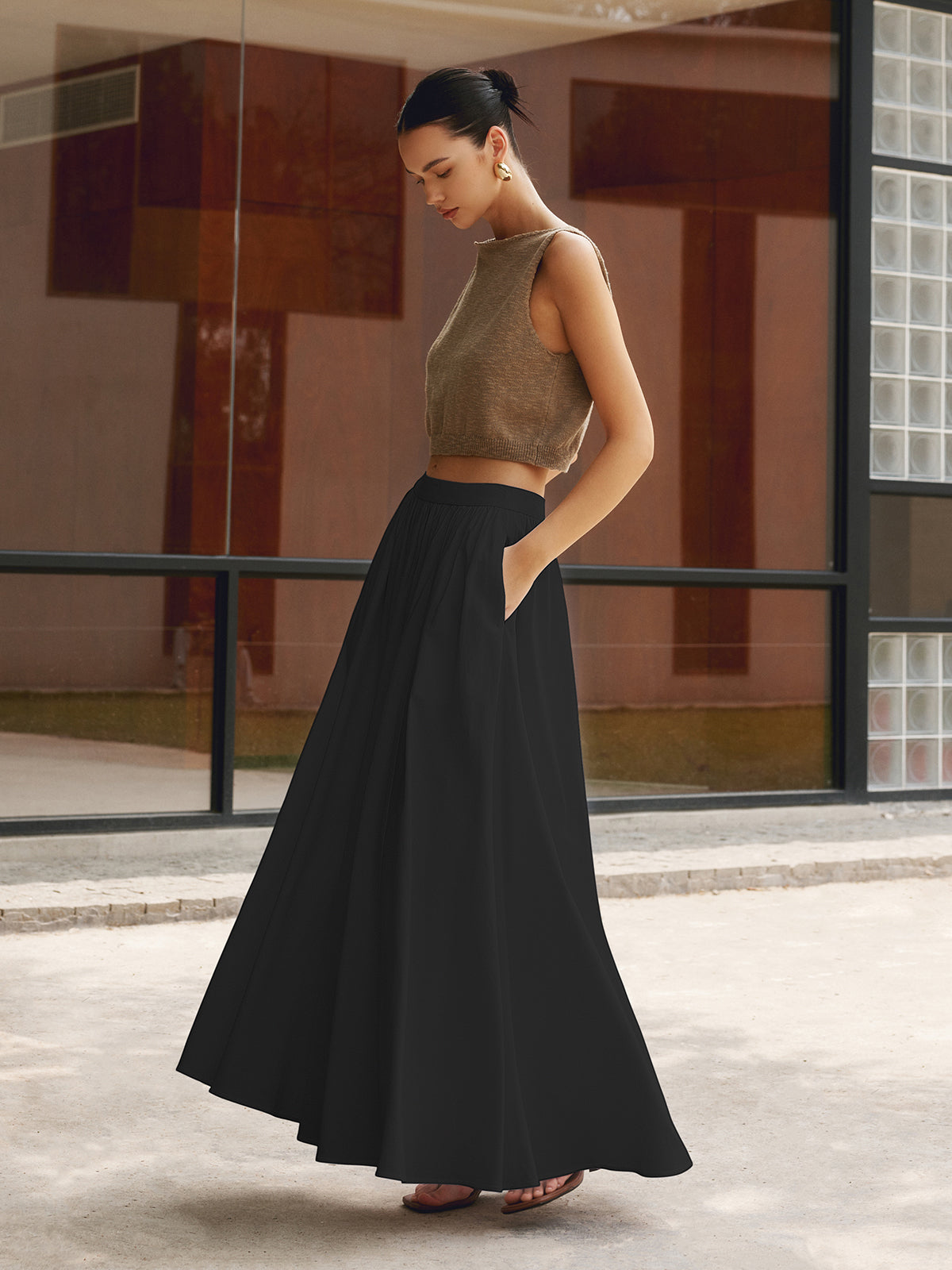 Women's high waist pleated A-line maxi skirt with pockets, elegant flowing silhouette