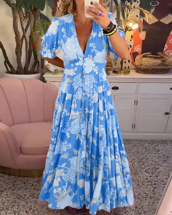 Soft flowy maxi dress with gentle waist cinching, lightweight summer style in graceful silhouette
