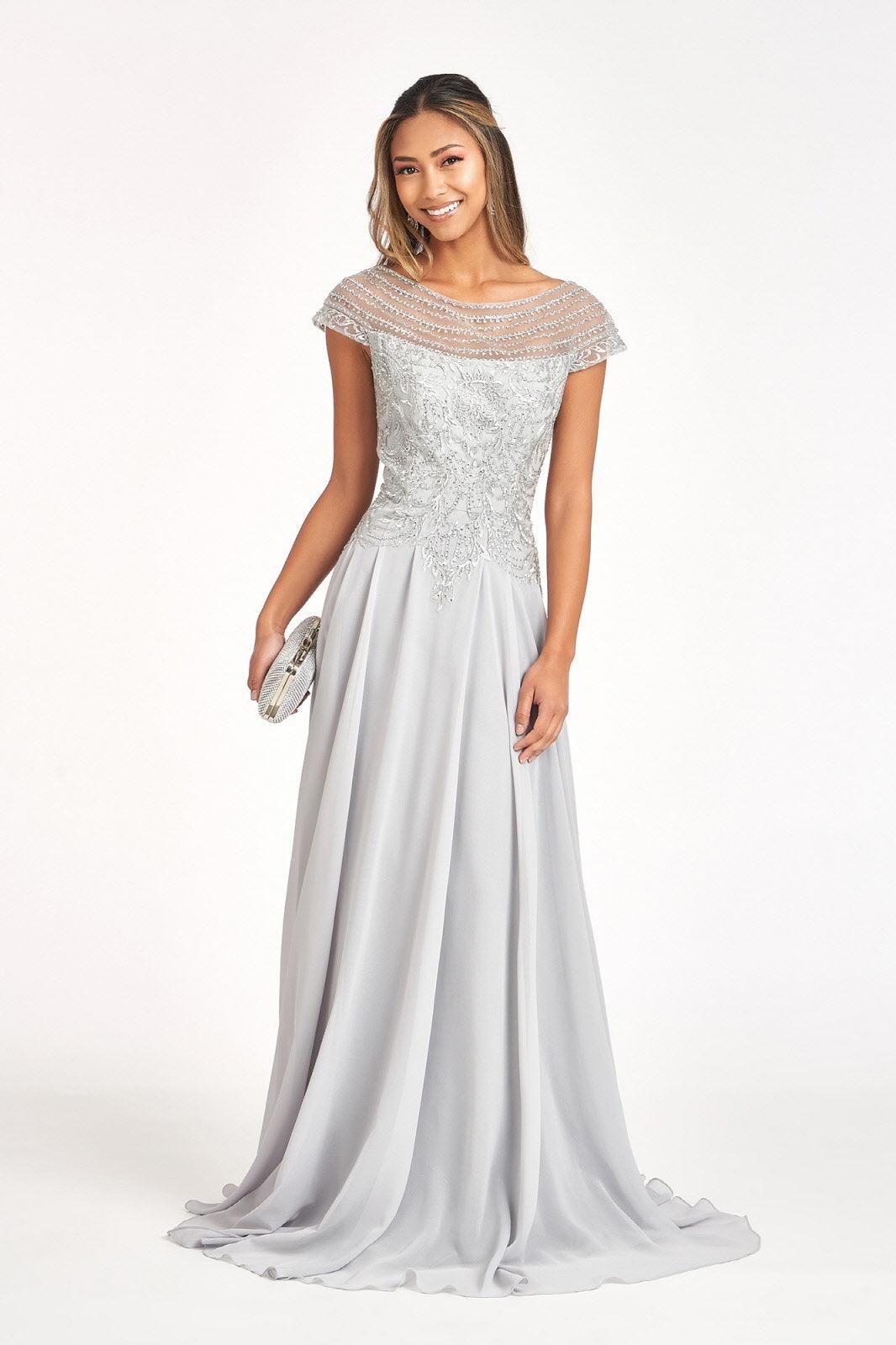 Long formal chiffon mother of bride dress with scoop neckline, cap sleeves, and delicate bodice embroidery