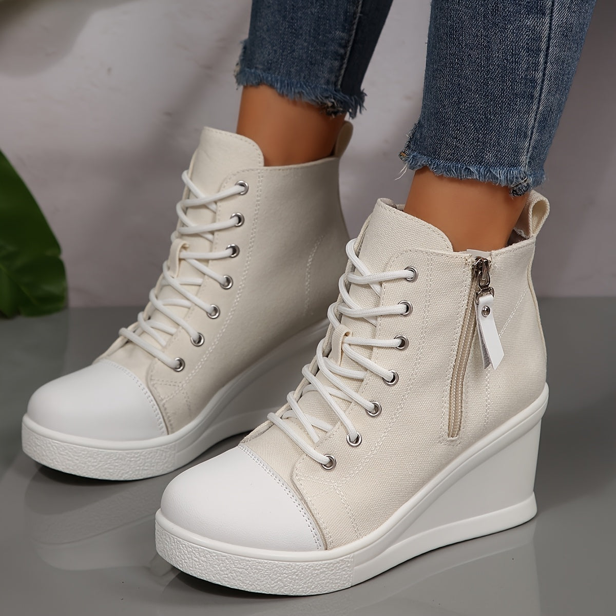 Women's white high-top wedge sneakers lace-up ankle style with built-in heel elevation