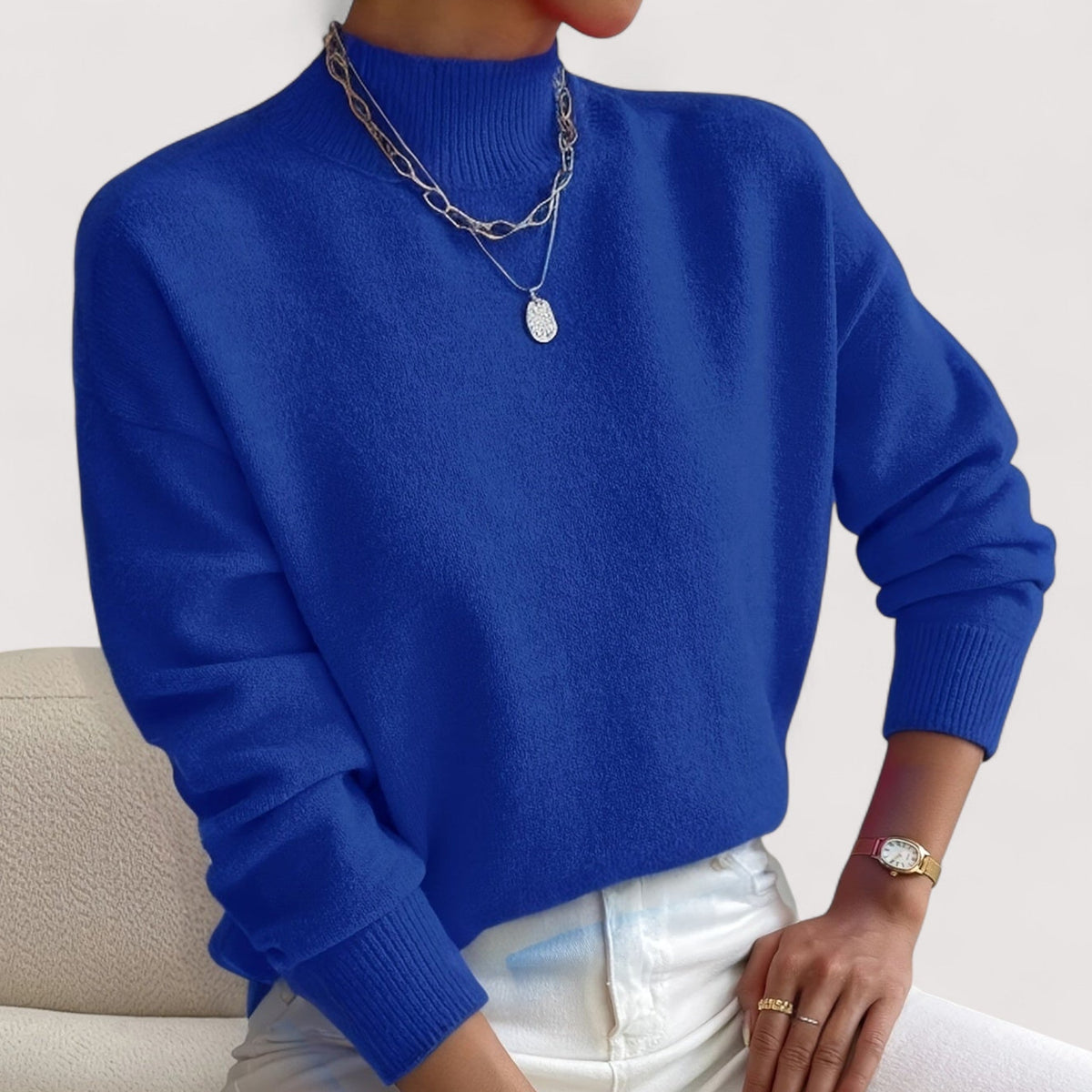 Elegant cream turtleneck sweater with flattering slim fit and ribbed neckline for all-day comfort