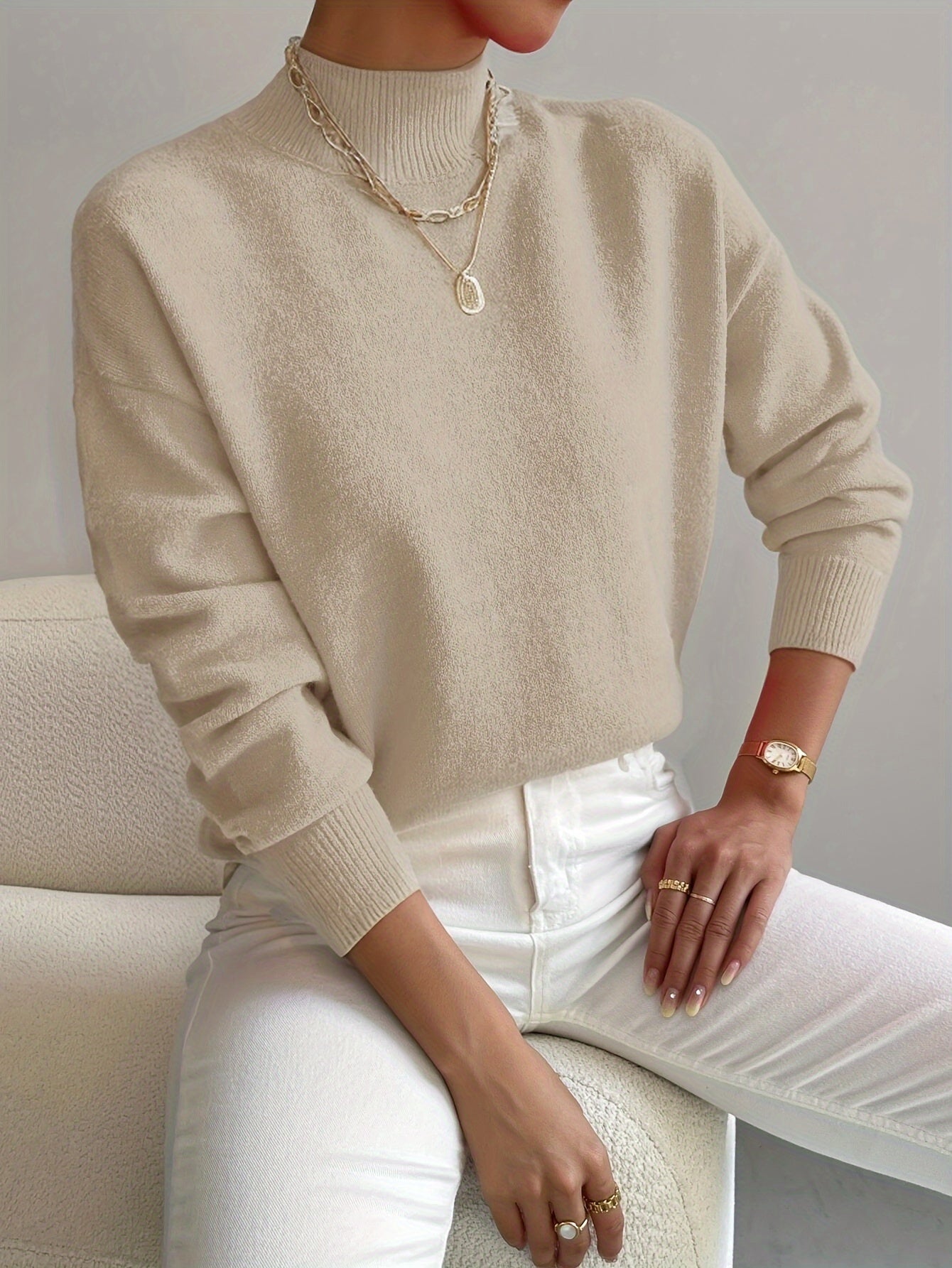 Elegant women's turtleneck sweater in classic style with slim flattering fit and refined neckline