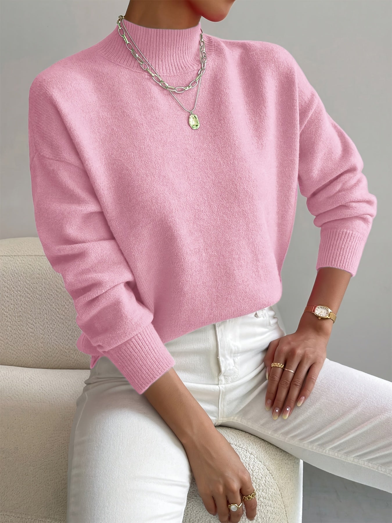 Elegant cream turtleneck sweater with slim flattering fit and classic elongating neckline design
