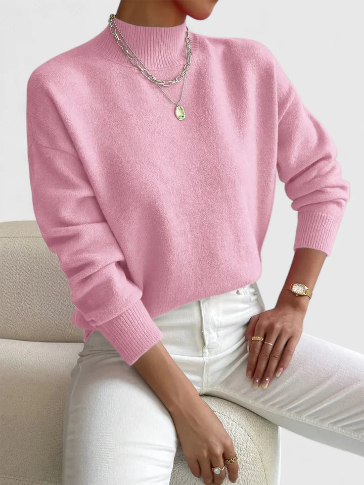 Elegant cream turtleneck sweater with classic high-neck design and soft breathable fabric for women