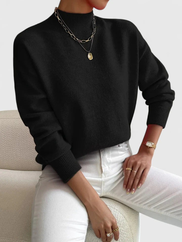 Elegant cream turtleneck sweater with classic high-neck design and soft breathable fabric for women