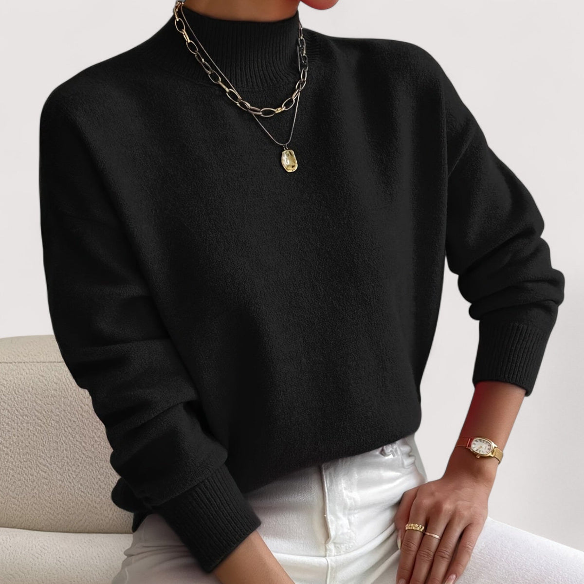 Elegant cream turtleneck sweater with flattering slim fit and soft ribbed neckline for all-day comfort