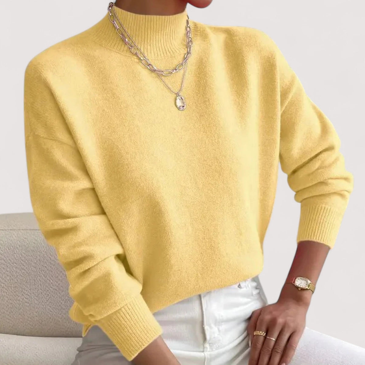 Elegant cream turtleneck sweater with flattering slim fit and soft skin-friendly knit fabric