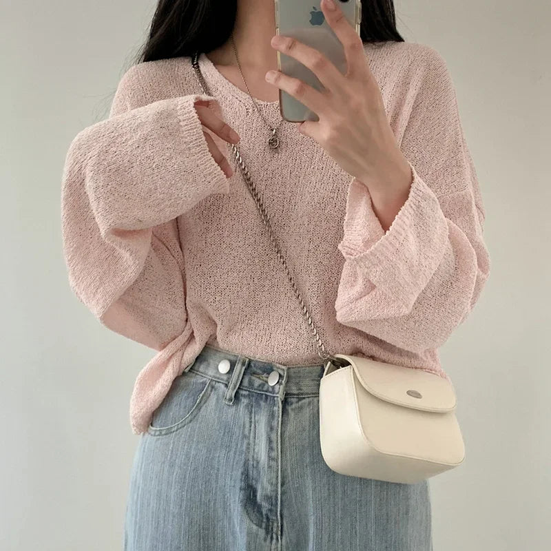 Women's elegant knit cardigan timeless layering essential with sophisticated comfort-focused design