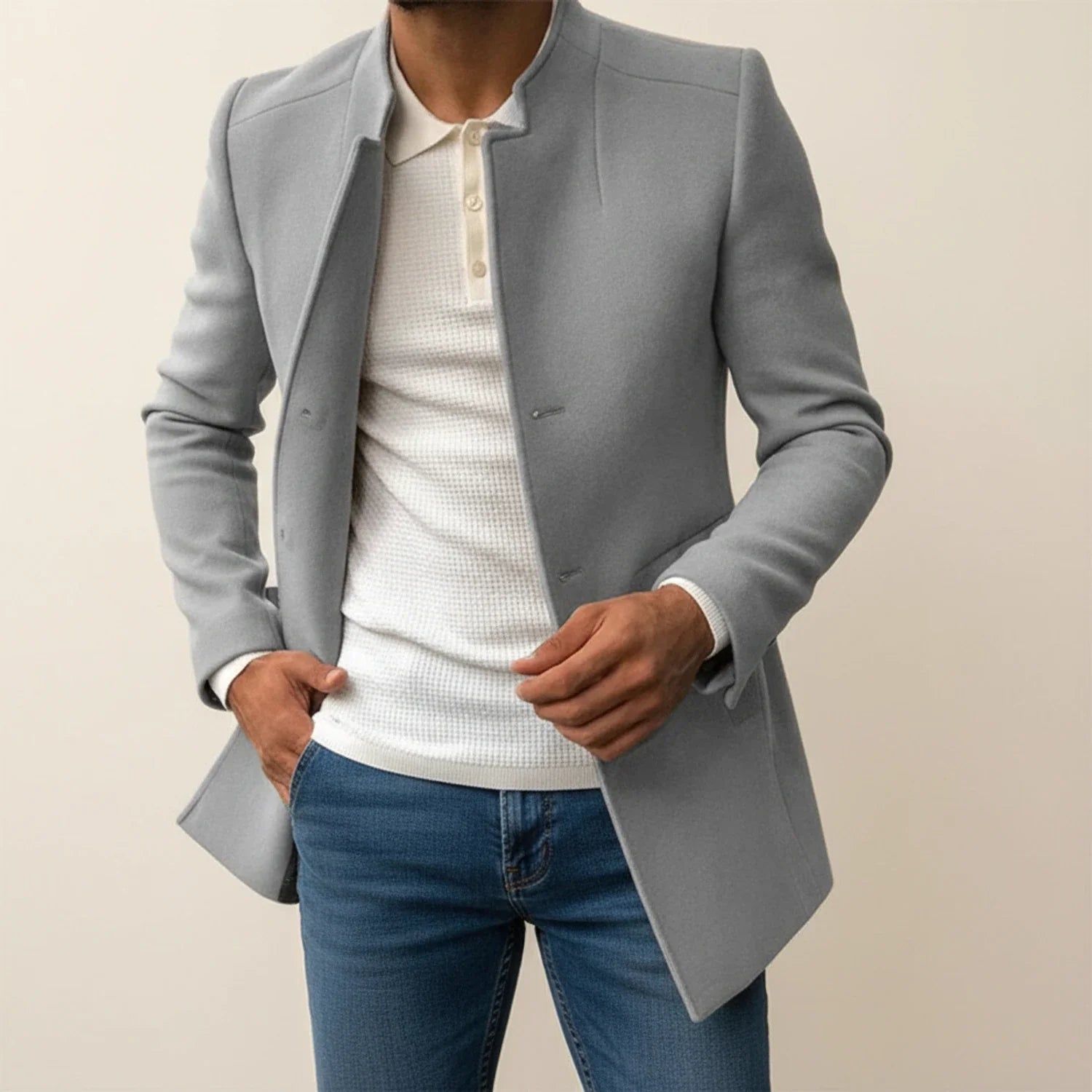 Tan slim fit mid-length men's overcoat with distinctive mandarin collar for modern formal style