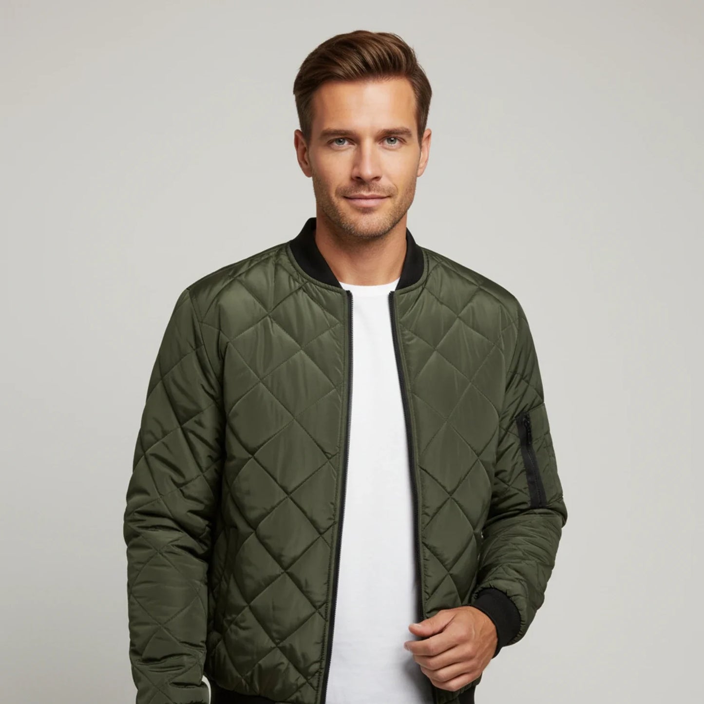 Black slim-fit quilted bomber jacket with diamond quilting pattern and lightweight zip-up design