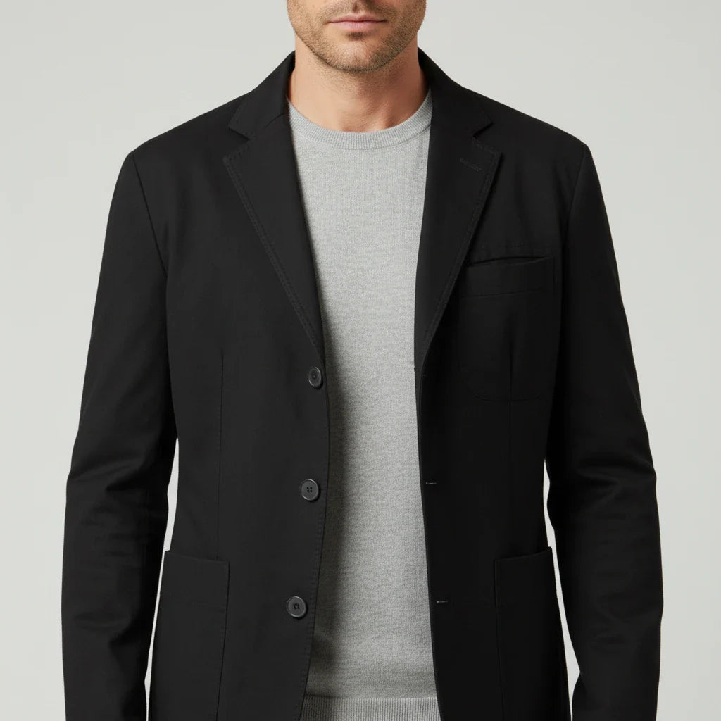 Men's casual blazer with notch lapel, three-button closure, patch pockets, and elbow patches