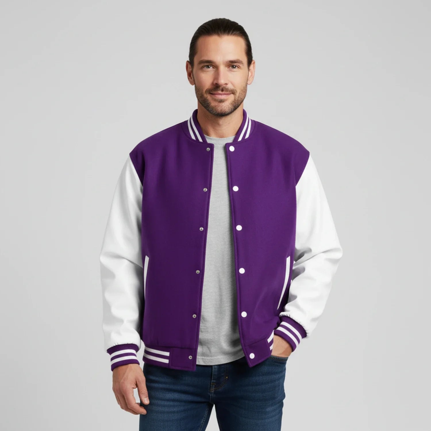 Men's black and white color block varsity jacket with contrast sleeves and ribbed trim