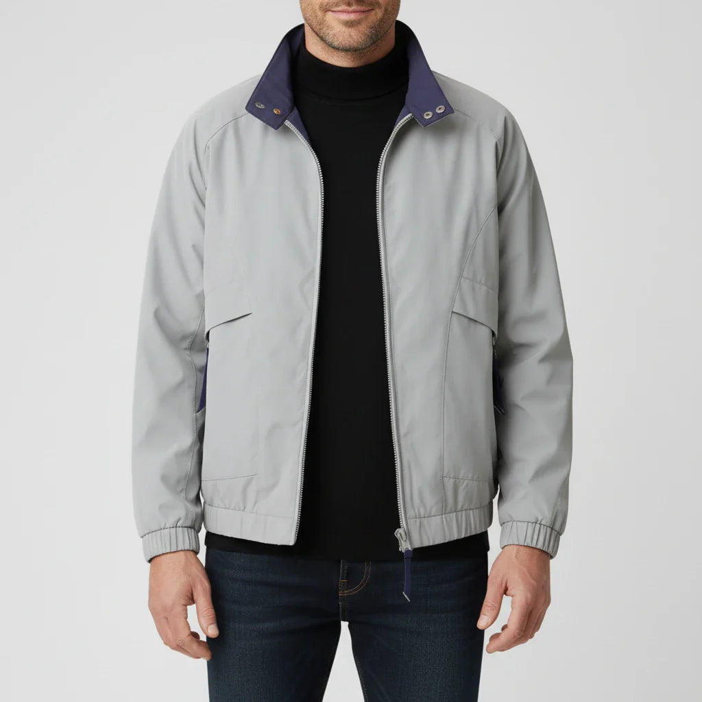 Men's lightweight windbreaker jacket with stand collar, zip-up closure, welt pockets, casual bomber fit