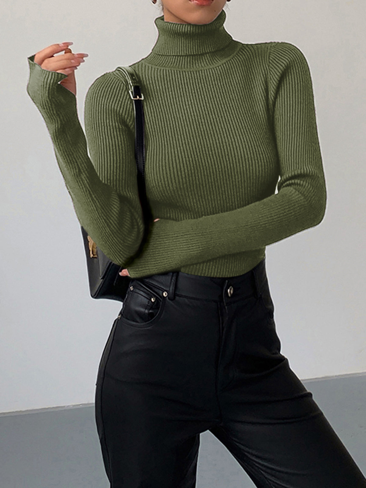 Minimalist slim fit turtleneck knit top in neutral tone with elegant plain design and medium stretch