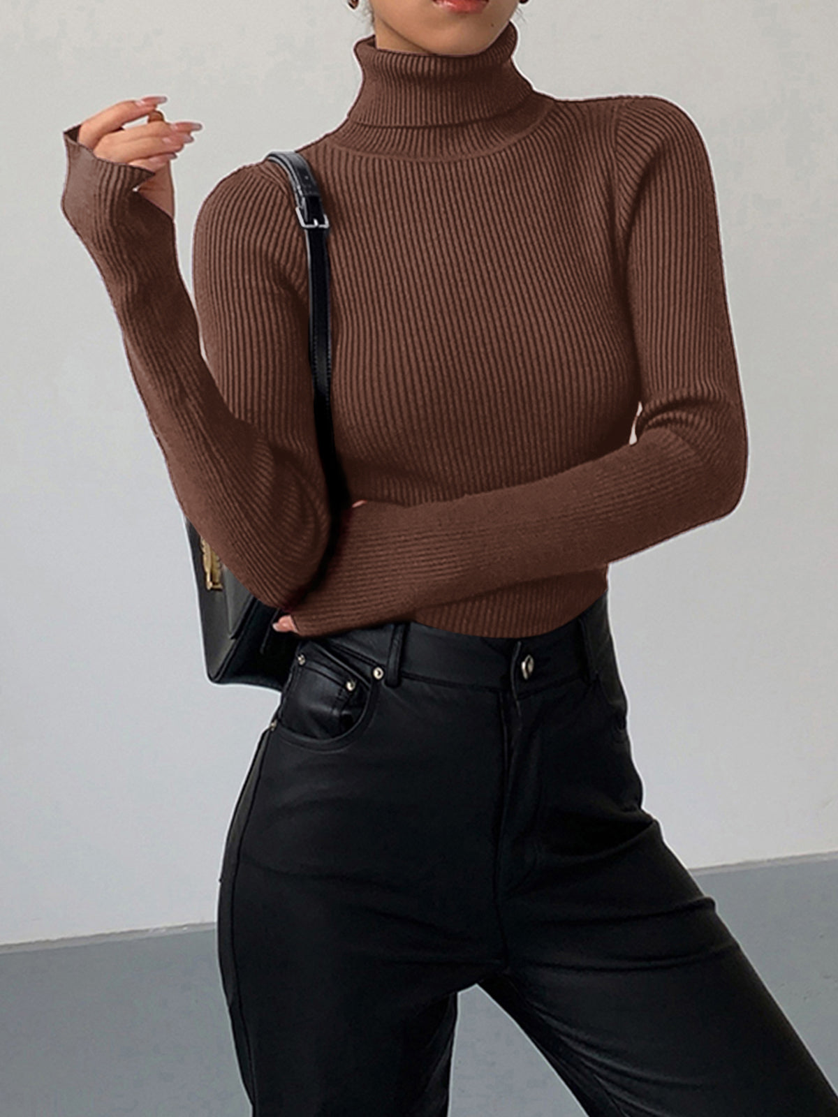 Minimalist slim fit turtleneck knit top in neutral tone with medium stretch elegant casual design