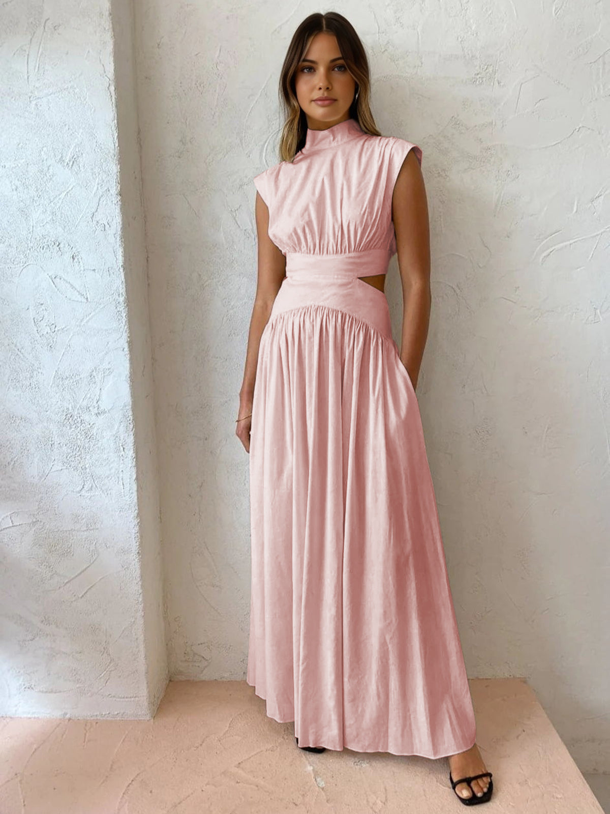 Black mock neck cutout maxi dress with sleek woven fabric and elegant long silhouette
