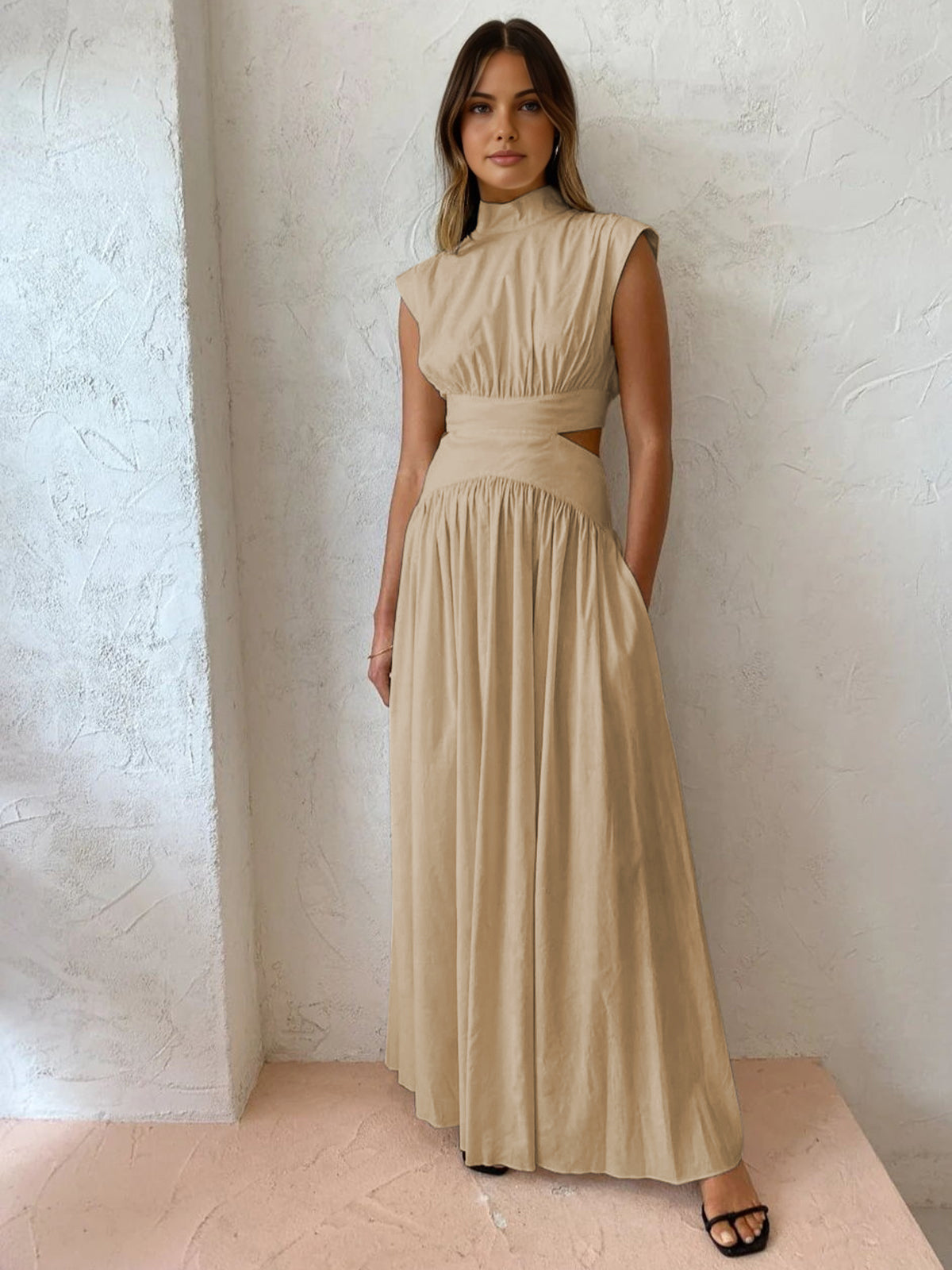 Black mock neck cutout maxi dress with sleek woven fabric and modern long silhouette