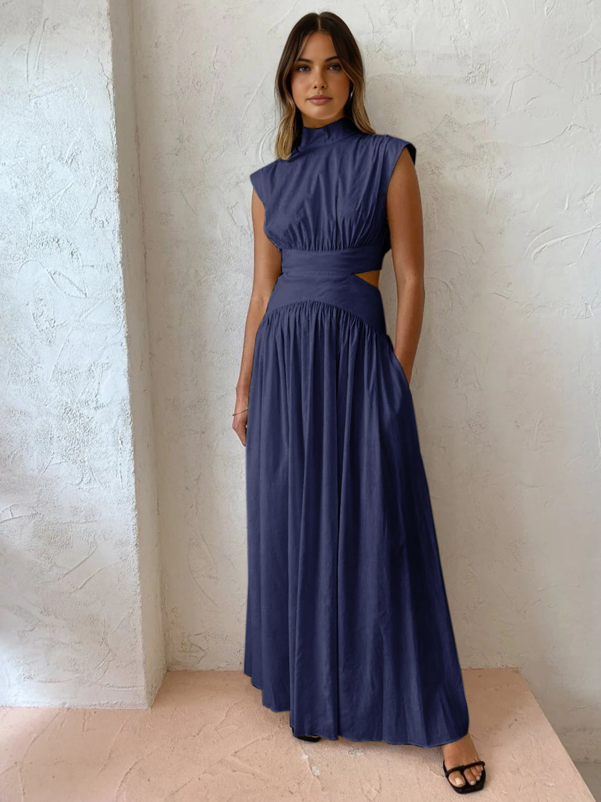 Black mock neck cutout maxi dress with sleek woven fabric and elegant long silhouette