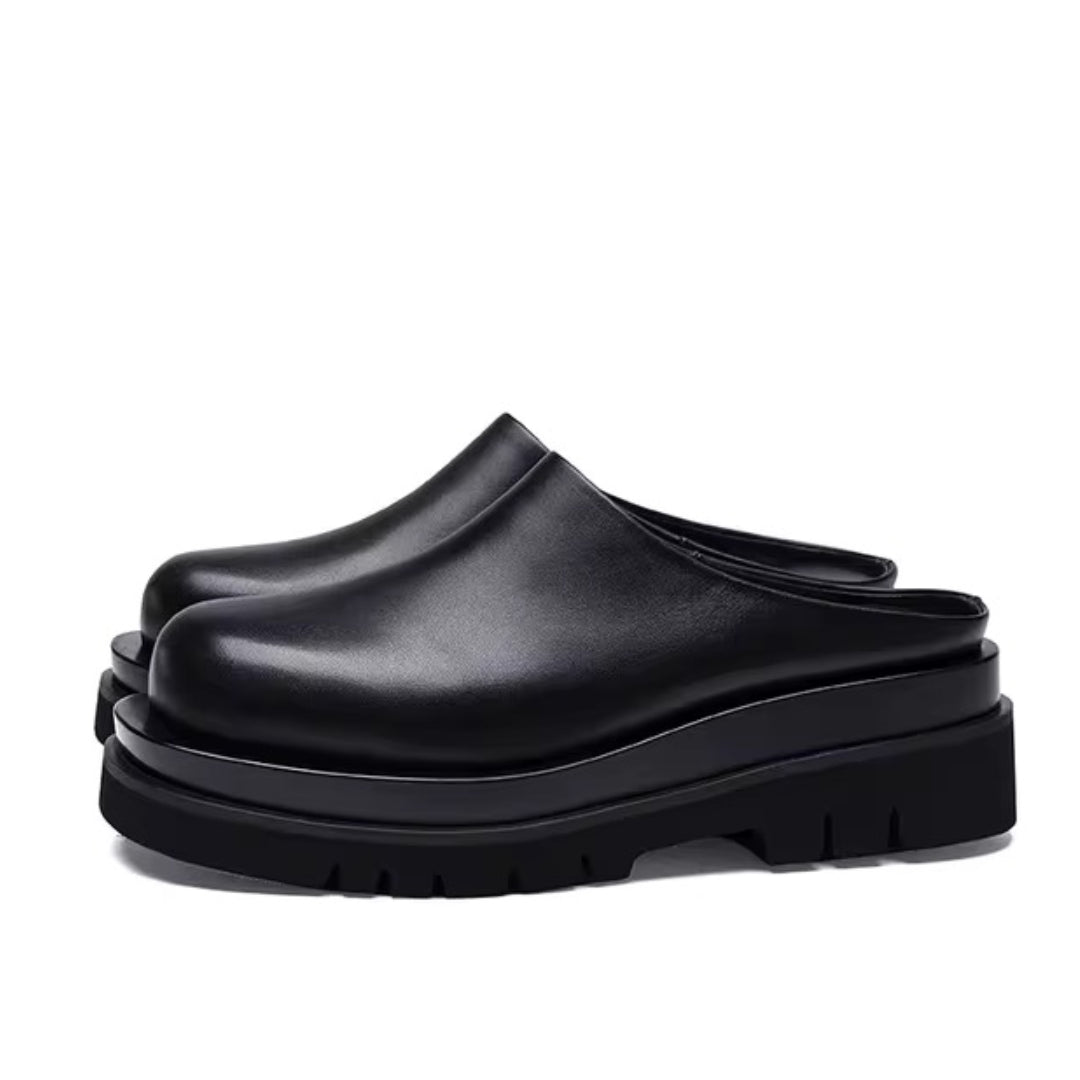 Melo black leather platform mules with chunky sole, minimalist slip-on style for women