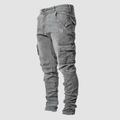 Men's slim fit cargo pants in neutral tones with multiple utility pockets for casual everyday wear