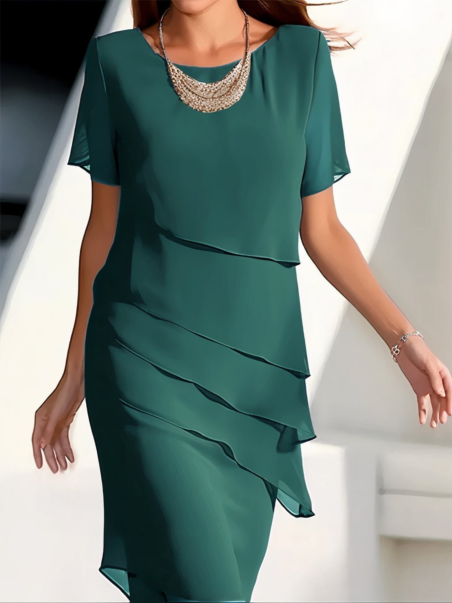 Arya tiered chiffon dress in soft flowing layers, relaxed silhouette with cascading drape detail