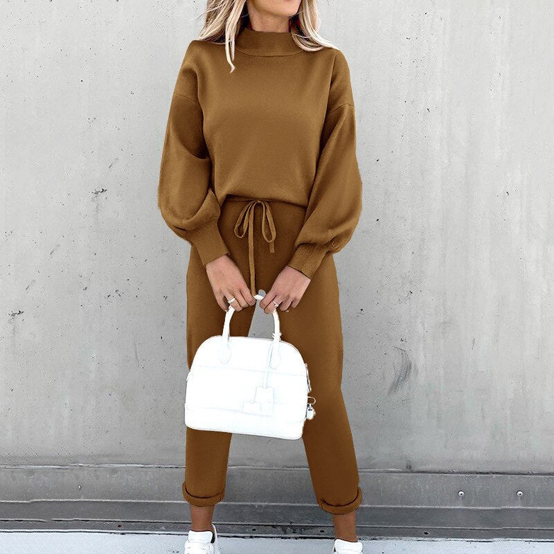 Relaxed-fit two-piece lounge set in neutral tones, lightweight polyester coordinated top and bottom