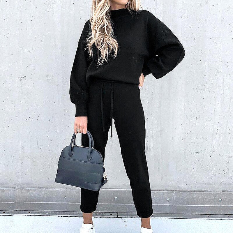 Relaxed-fit two-piece lounge set in coordinated neutral tones, lightweight polyester fabric for effortless comfort