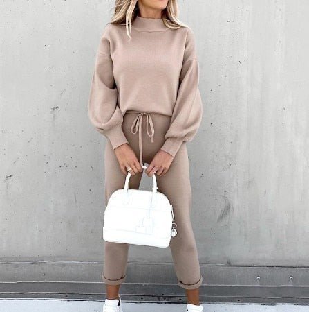 Relaxed-fit two-piece lounge set in neutral tones, lightweight polyester top and bottom coordinated ensemble