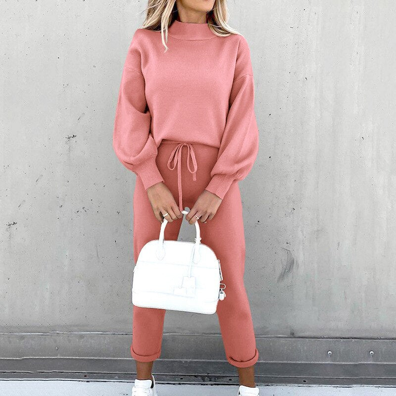 Relaxed-fit two-piece lounge set in neutral tones, lightweight polyester coordinated top and bottom