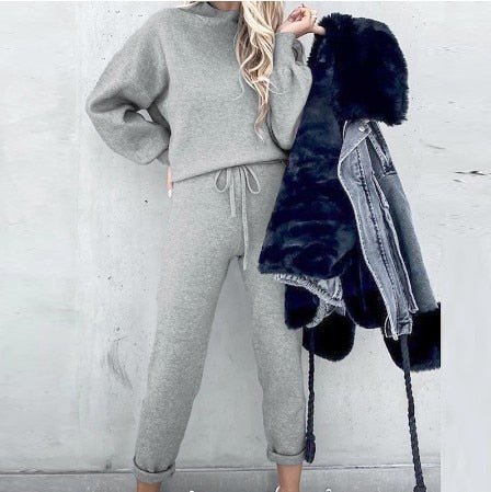 Relaxed-fit two-piece lounge set in neutral tones, lightweight polyester coordinated top and bottom