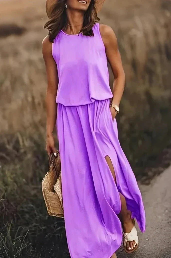 Women's sleeveless maxi dress, loose empire waist fit in solid color with front slit detail