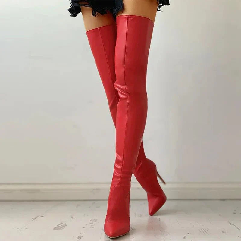 Black thigh-high stiletto boots with sleek leg-lengthening silhouette and slim heel