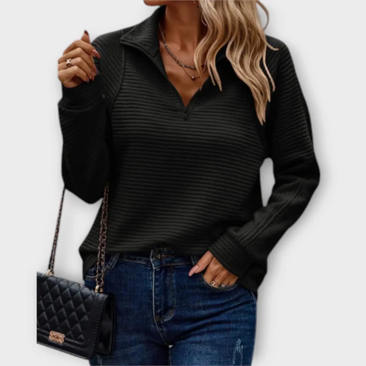 Women's half-zip pullover in neutral tone, sporty-chic cut with adjustable zip neckline detail