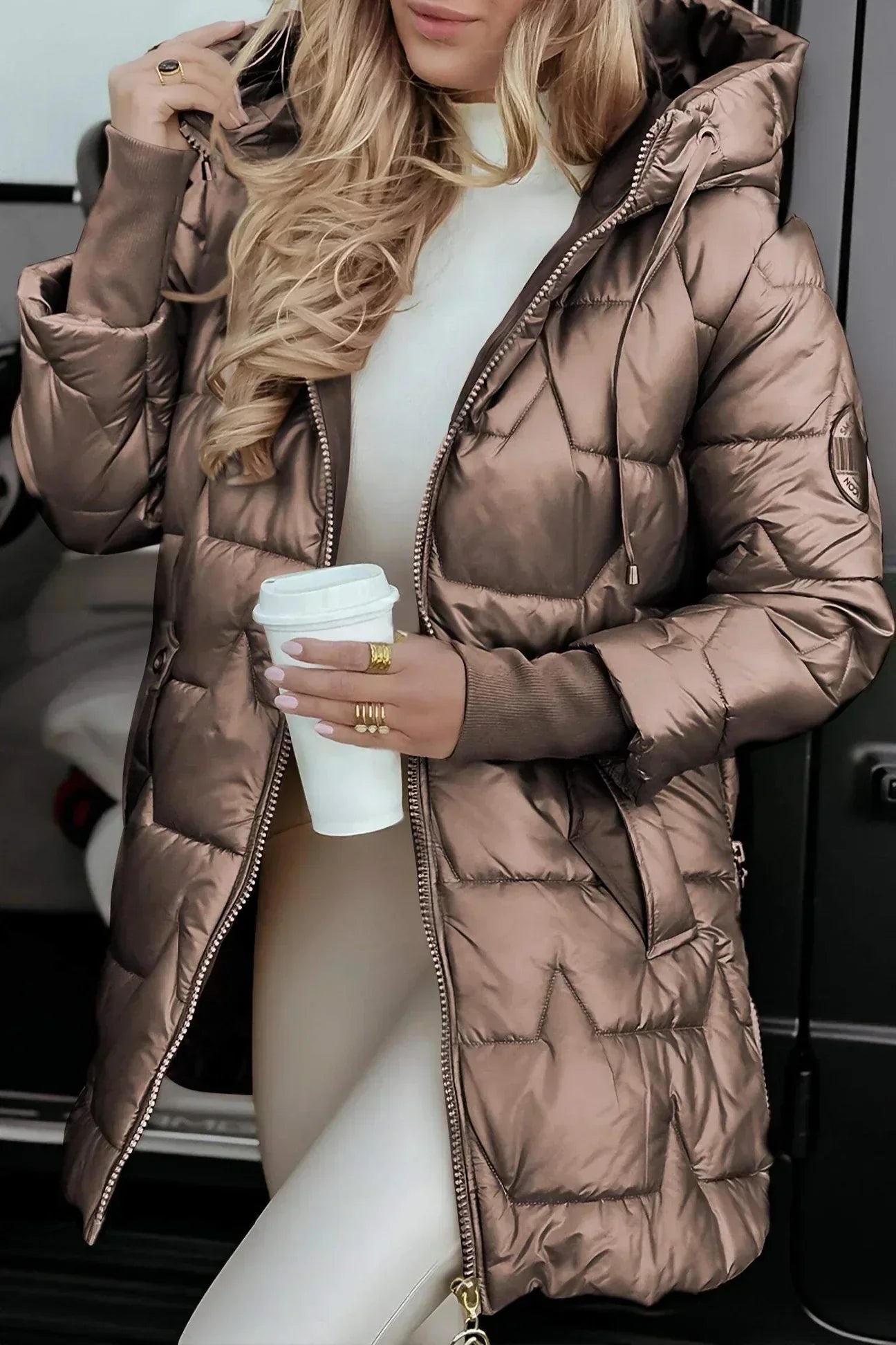 Black Raven tailored winter coat with sleek contemporary silhouette and cozy insulated design