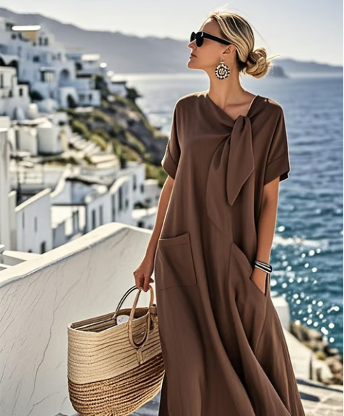 Floral midi dress relaxed silhouette with chic neck tie detail and practical pockets, feminine everyday style