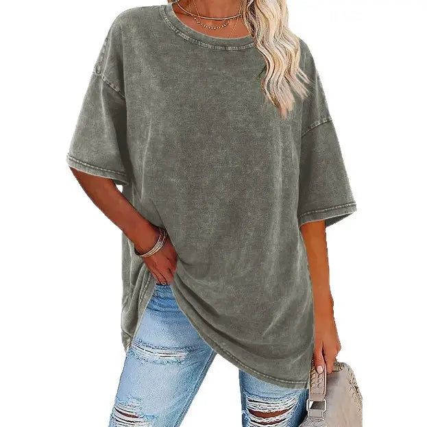 Women's oversized vintage white t-shirt with relaxed fit and worn-in classic design