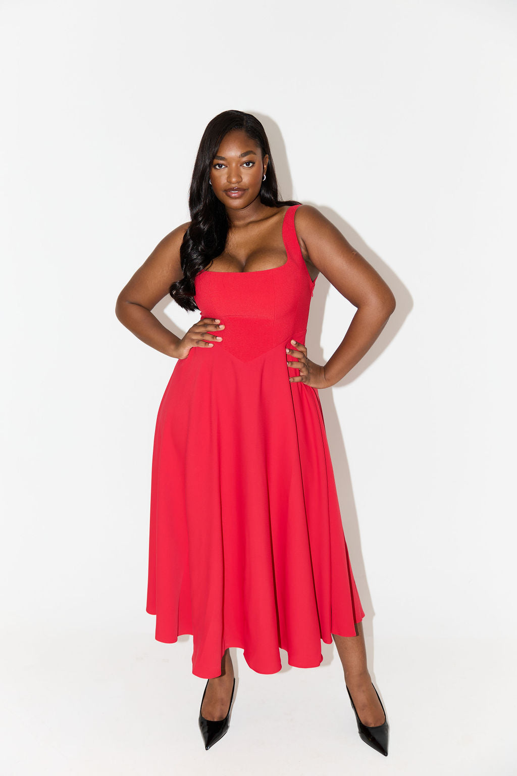 Flowy midi dress square neckline fitted waist elegant silhouette for weddings and special occasions