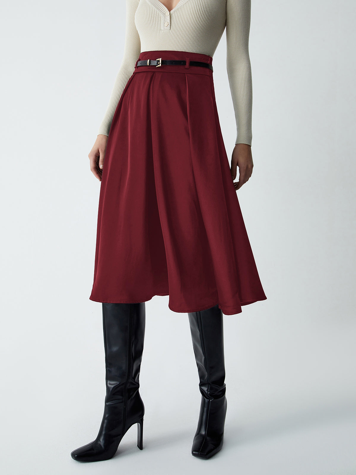 Beige midi belted skirt with shift silhouette and waist-cinching detail for an old money aesthetic