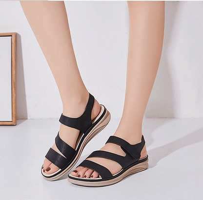 Women's comfort wedge sandals in neutral tones, elegant lifted silhouette with built-in comfort support