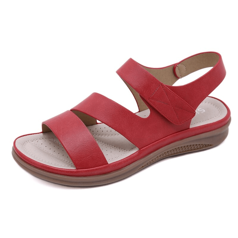 Women's comfort wedge sandals in neutral tones, elegant lifted silhouette with cushioned supportive sole